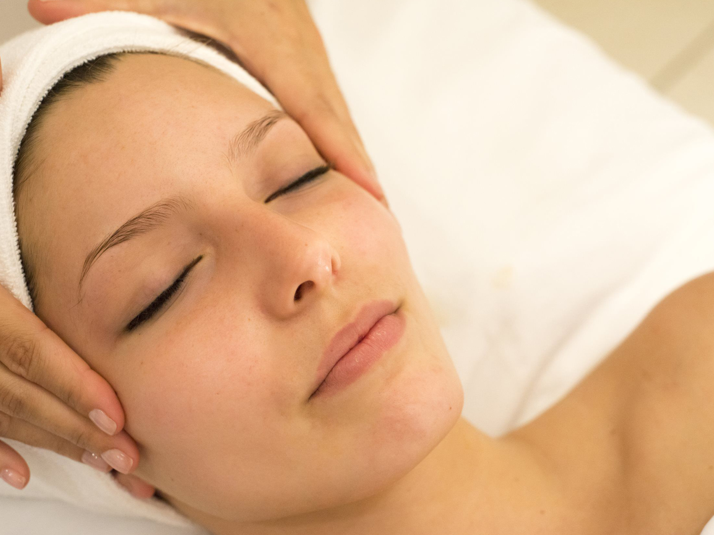 woman enjoying dermaplaning