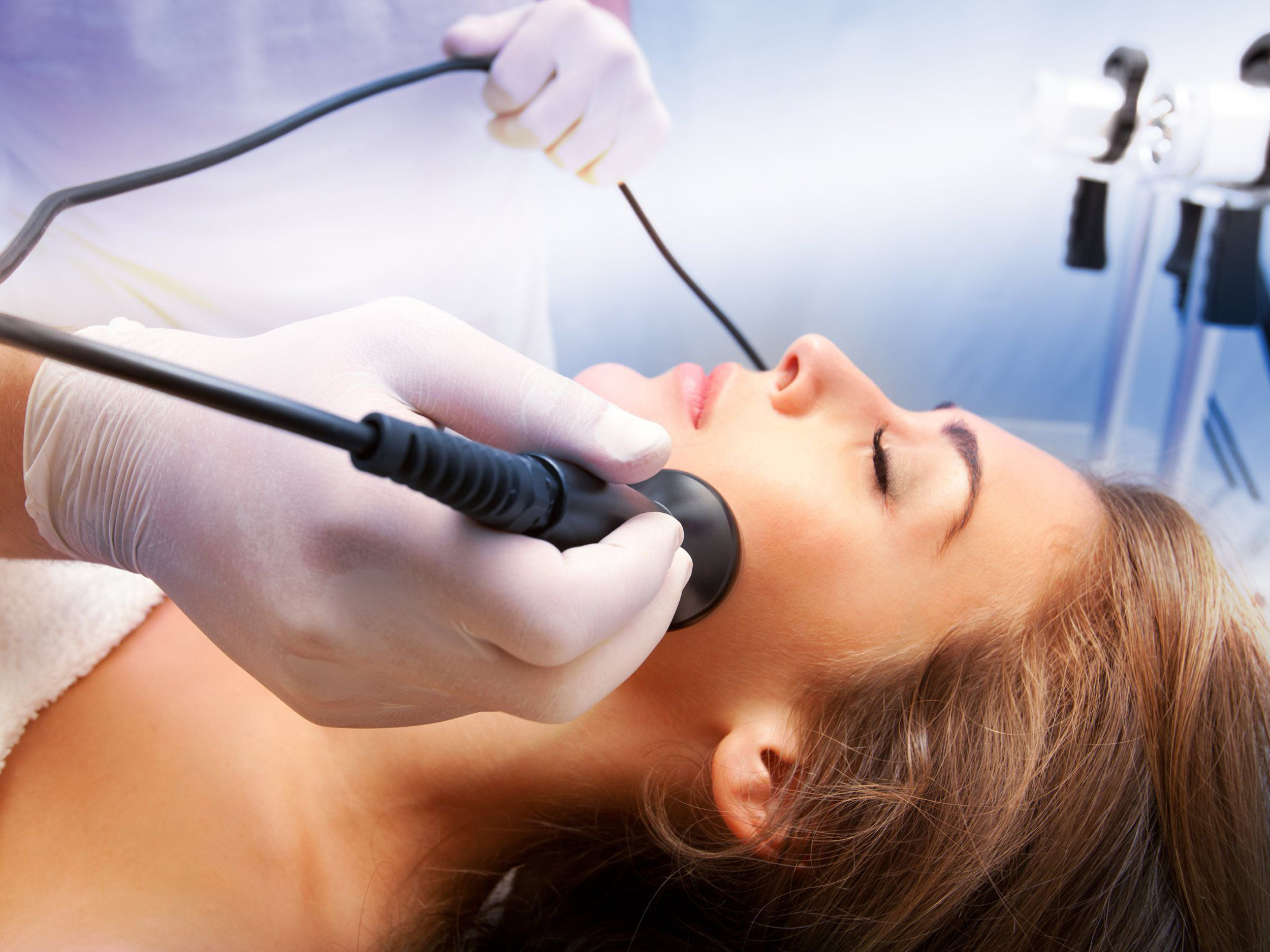 woman enjoying microdermabrasion